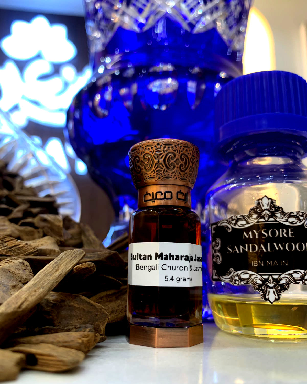 Sultan Maharaja Jasmine attar next to Mysore sandalwood oil